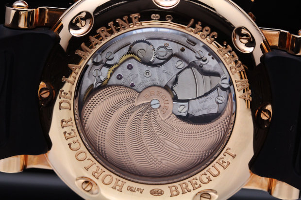 Movement/Winding Self-winding Power reserve (hours) 45 Calibre 519 R Lines 12 / Jewels 36 Frequency 4  Balance-wheel Regulating screws Escapement Swiss straight-line lever Balance-spring Flat Oscillating weight 18 Carats